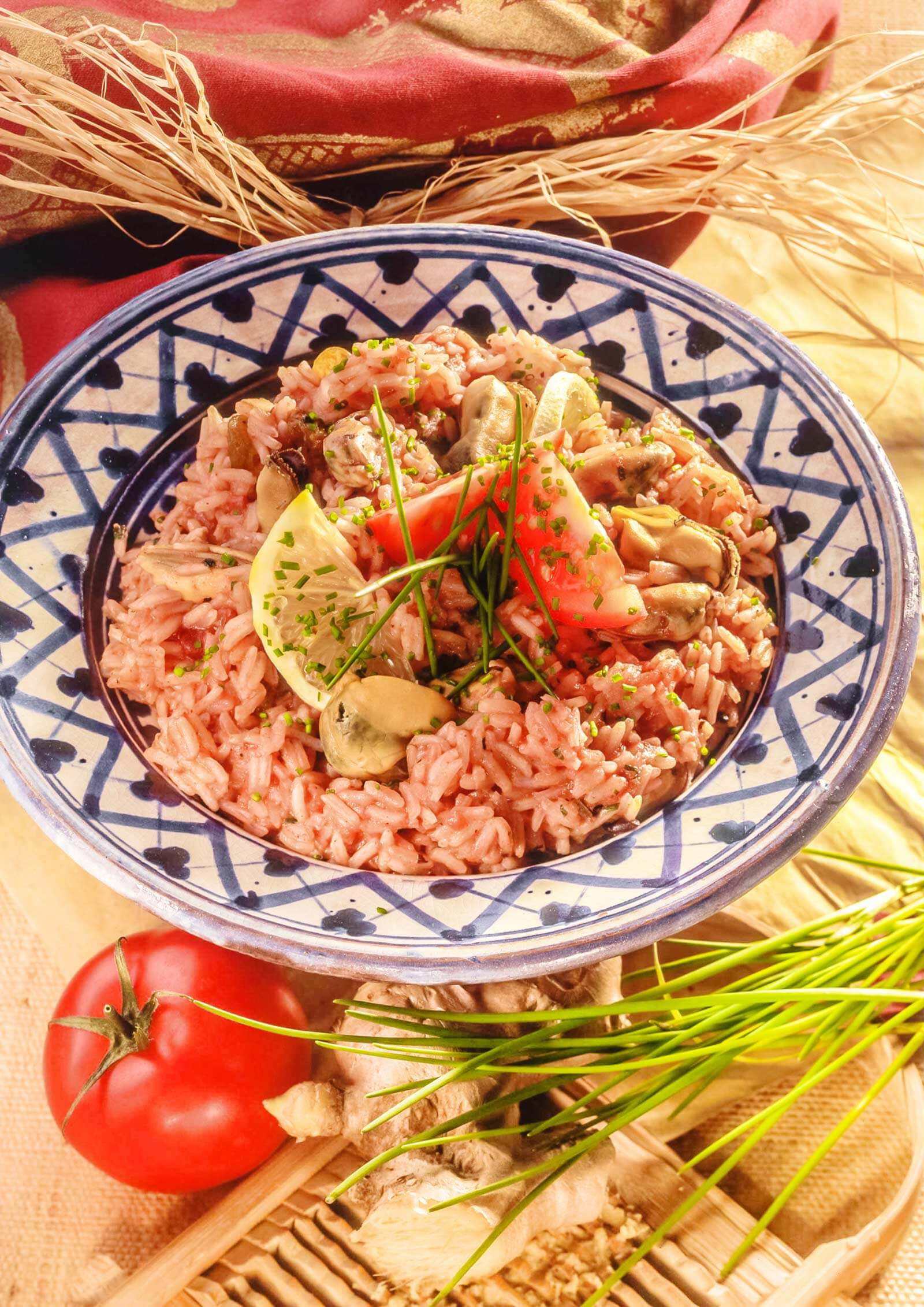 Bosto - Rode rijst met tomaat, mosselen, citroen, vis, zeevruchten, tomaten, recept